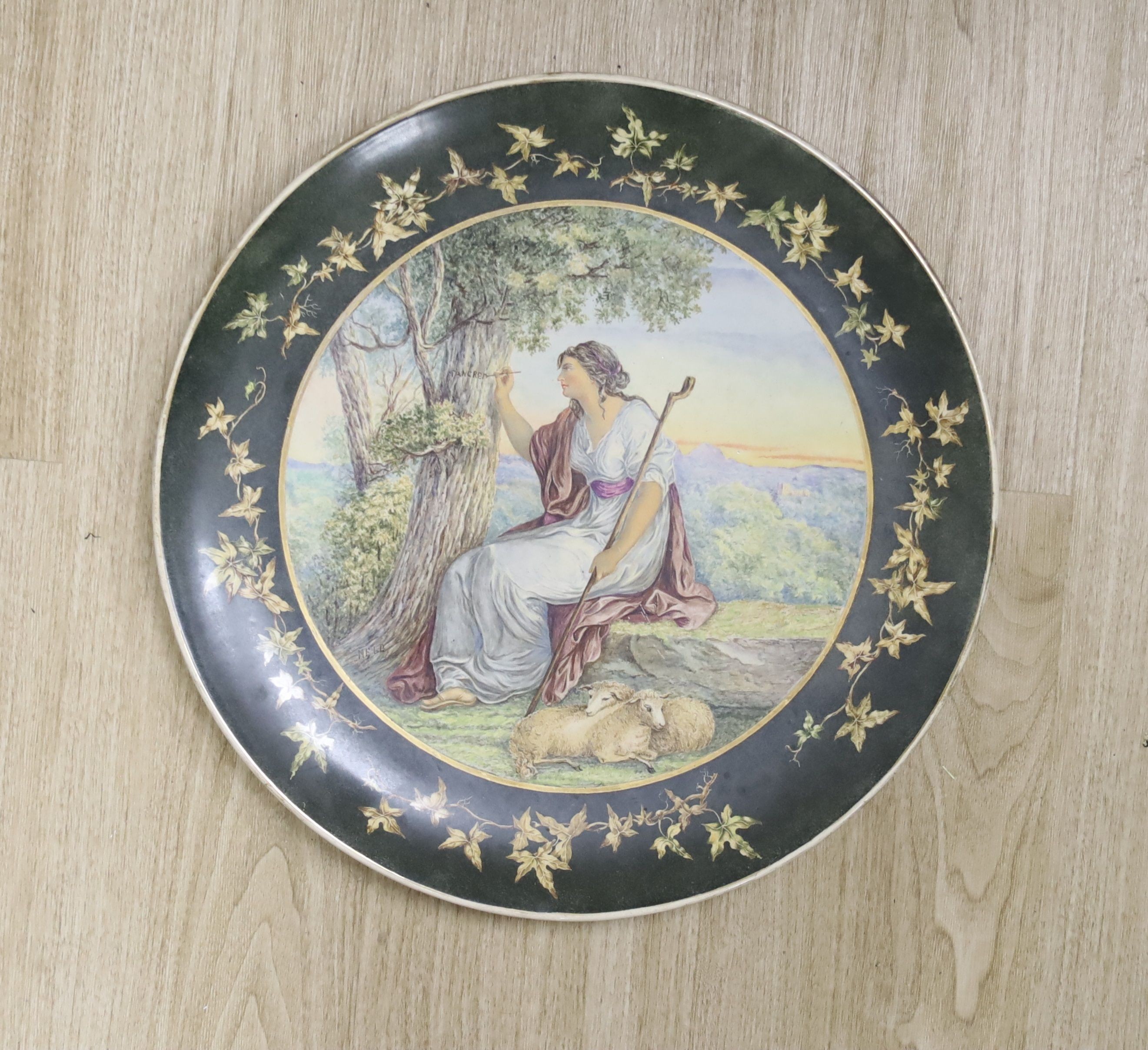 A large Victorian amateur decorated charger, diameter 44cm